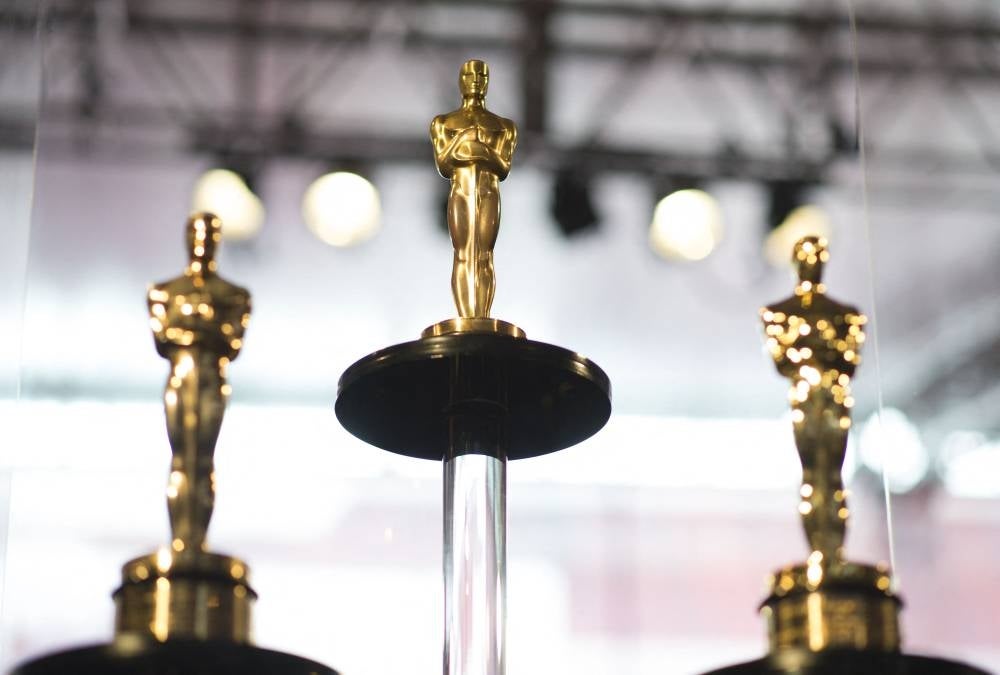 In this file photo taken on March 1, 2018, Oscars statuettes stand on display during a preview for the Governors Ball during the 90th annual Academy Awards week in Hollywood, California. (Photo by Valerie MACON / AFP)