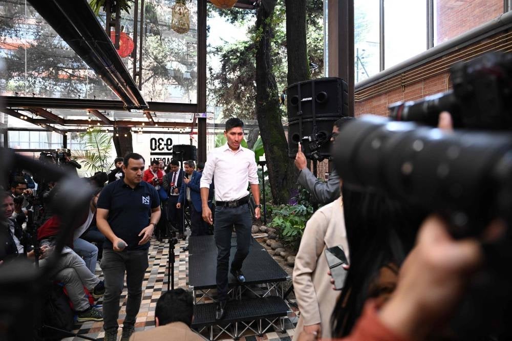 Colombian cyclist Nairo Quintana (C) leaves after a press conference in Bogota on Jan 25,.Colombian great Nairo Quintana insisted on Wednesday he was not ready to give up after local media had speculated he would announce his retirement after failing to find a new team for this season. The 32-year-old left Arkea-Samsic last year after he was stripped of his sixth-placed finish in the 2022 Tour de France following a positive test for a banned pain relief medication. - AFP