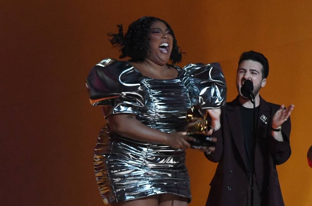 US singer Lizzo accepts the Record Of The Year award for "About Damn Time" during the 65th Annual Grammy Awards at the Crypto.com Arena in Los Angeles on February 5, 2023. (Photo by VALERIE MACON / AFP)