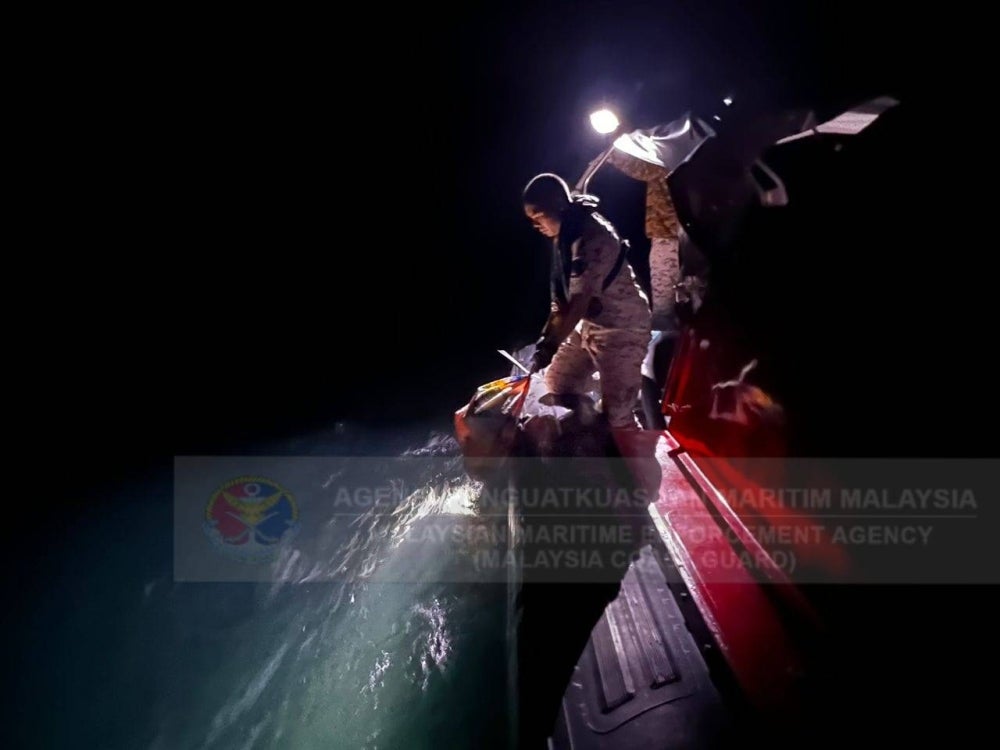 The sack containing cannabis was thrown into the sea before the boat changed course to turn back towards the Thai border. Photo from Malaysian Maritime Enforcement Agency's Facebook page.