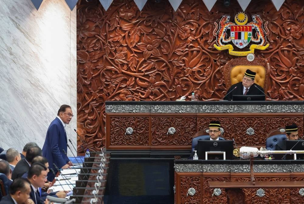 Anwar during the PM question time at the Parliament today - Bernama photo