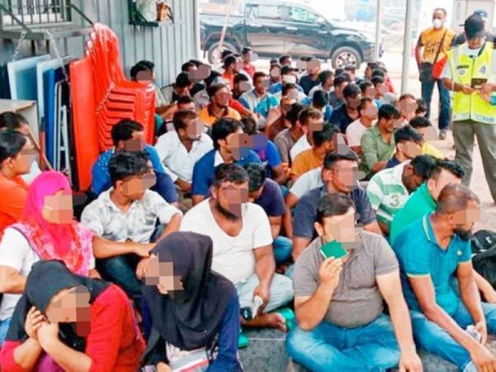 Undocumented immigrants detained in a raid 