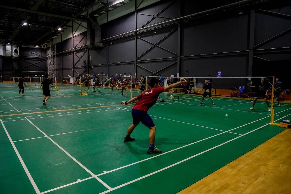The national squad undergo training at the Akademi Badminton Malaysia