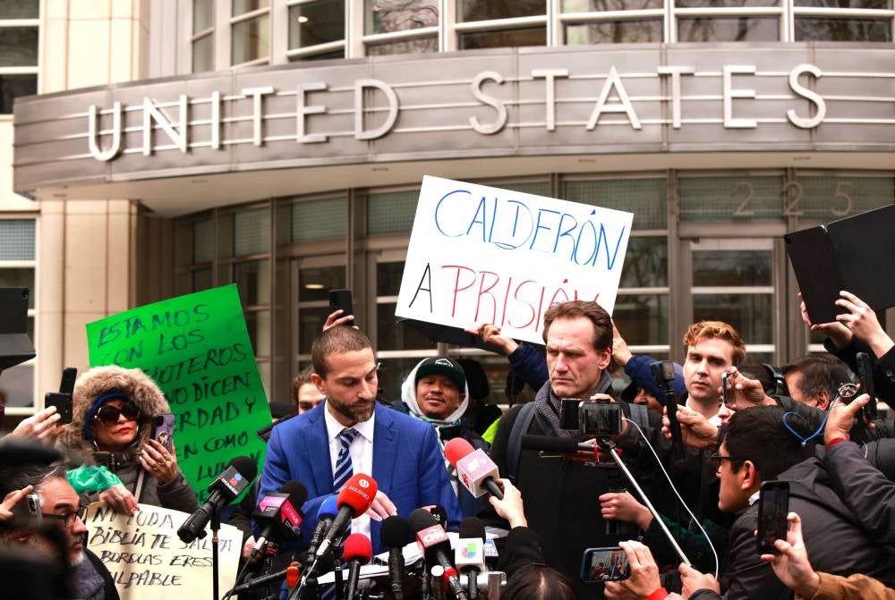 Attorney Cesar de Castro speaks to members of the media after a verdict was announced at the courthouse where the trial of former Mexican Secretary of Public Security Genaro Garcia Luna was held. Mexico's once-powerful former public security minister Genaro Garcia Luna was found guilty of US drug trafficking charges by a jury in New York on Tuesday following a high-profile trial.- AFP