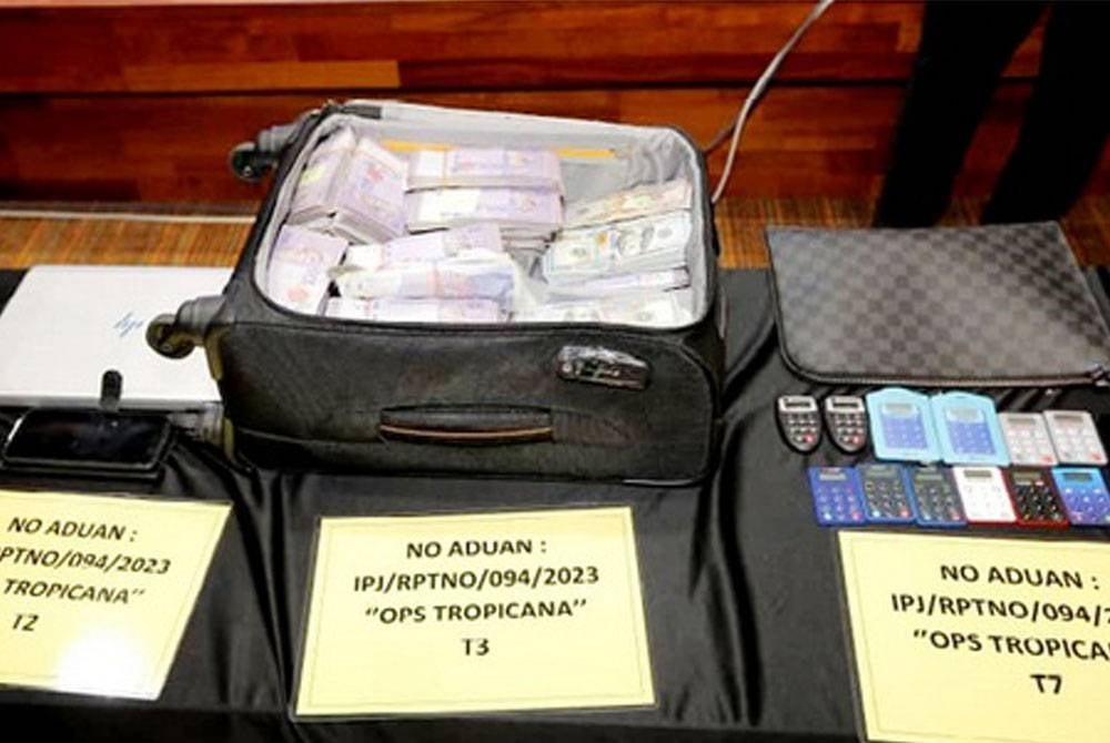 The cash seized following the Op Tropicana raid on Feb 21.