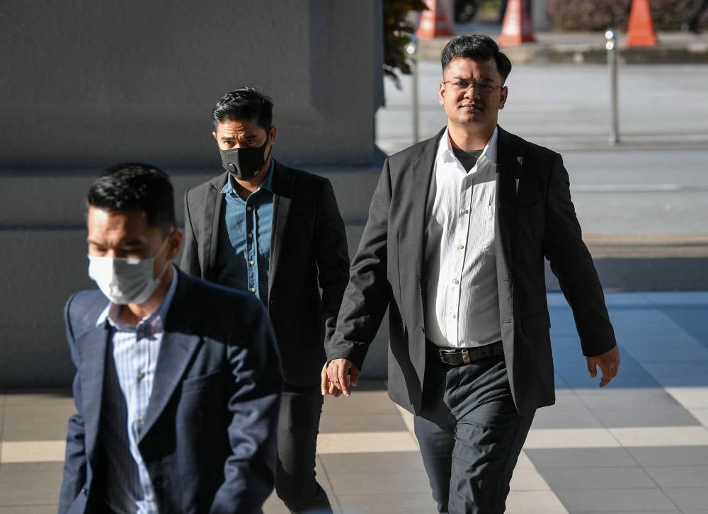 Mohamad Shafiq Abdul Halim, 32, who is also a political observer, was charged with failing to comply with an order to appear for oral examination in connection with a case investigated by the MACC - BERNAMA