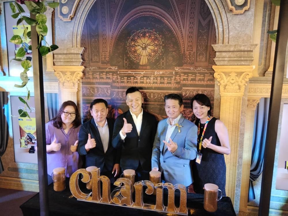 Julie's Biscuits Director Tzy Horng Sai (centre) during the launch of the new biscuits range at the 'Me, Myself and Charm' launch in APW Bangsar on Friday - FILEPIX