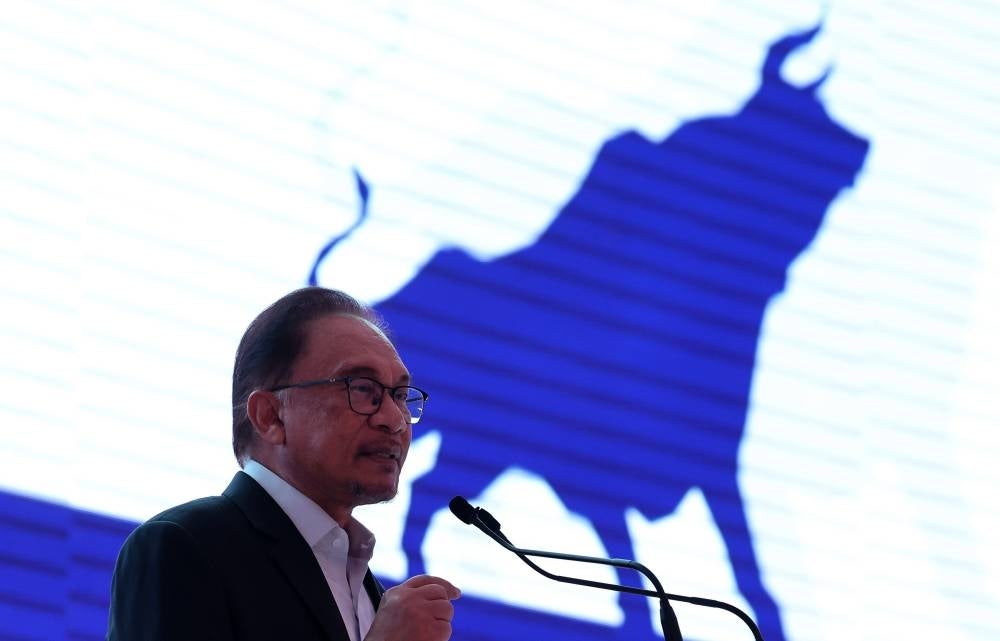 Prime Minister Datuk Seri Anwar Ibrahim delivering his keynote address at Invest Malaysia 2023. - BERNAMA