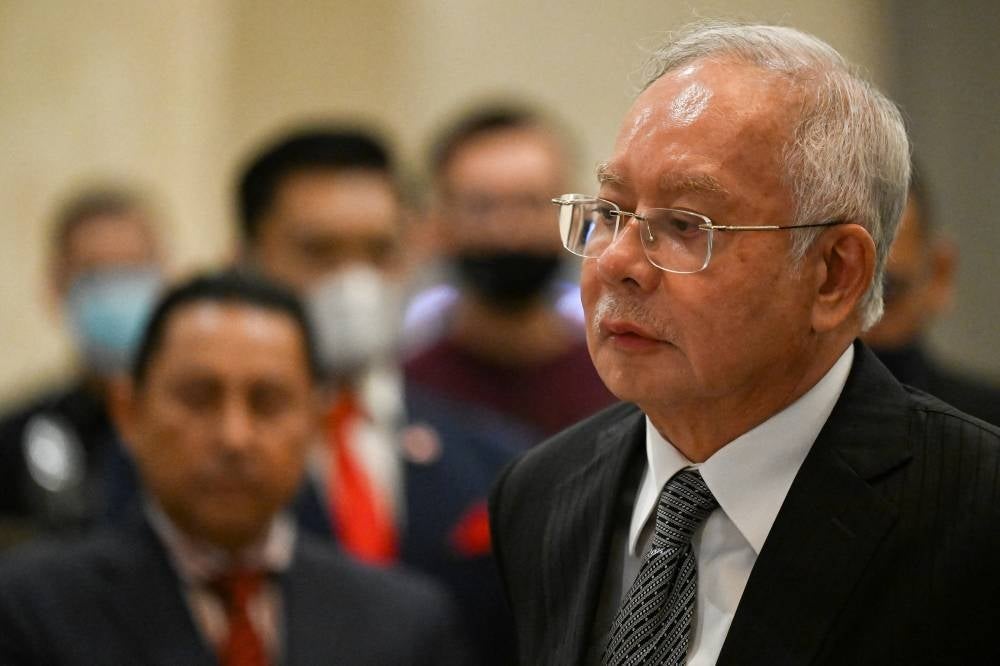 The Federal Court has set March 31 to give its verdict in former prime minister Datuk Seri Najib Razak’s bid to review his conviction and sentence of his RM42 million SRC International Sdn Bhd case. - Photo: AFP