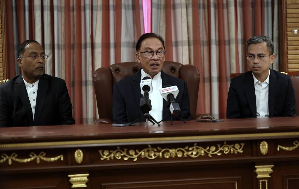 Prime Minister Datuk Seri Anwar Ibrahim at a press conference in conjunction with his official visit to Saudi Arabia today.Also present were Foreign Minister Datuk Seri Dr Zambry Abd Kadir (left) and Communications and Digital Minister Fahmi Fadzil - BERNAMA