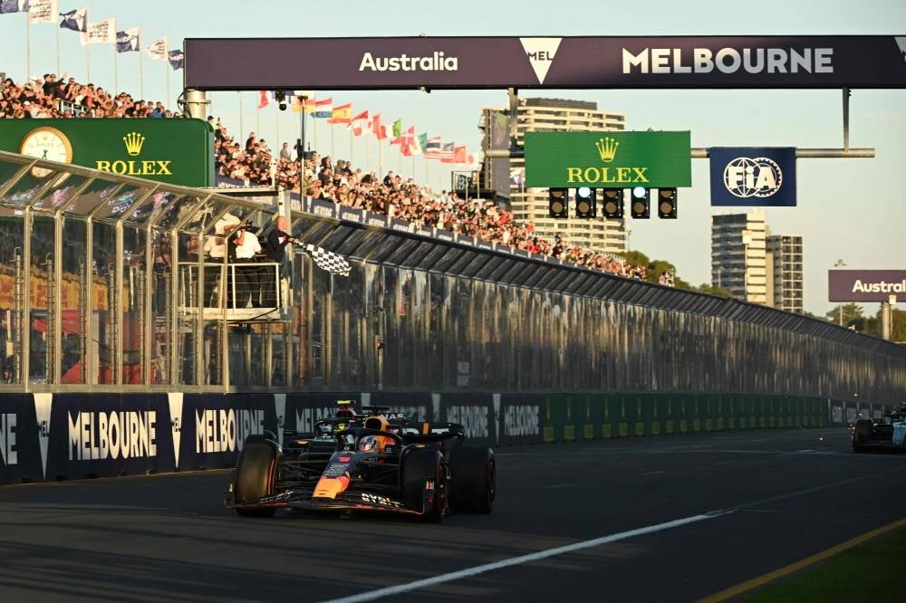 Red Bull Racing's Dutch driver Max Verstappen crosses the chequered flag to win the 2023 Formula One Australian Grand Prix at the Albert Park Circuit in Melbourne on April 2. - Pic: AFP