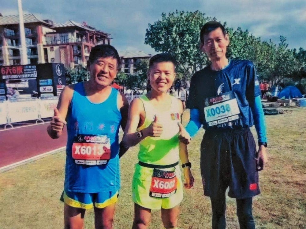 He Ming (R) reacts after completing the 2019 Xiamen 6-Day Race. (Photo provided by Gao Zhenhai, He Ming's friend)