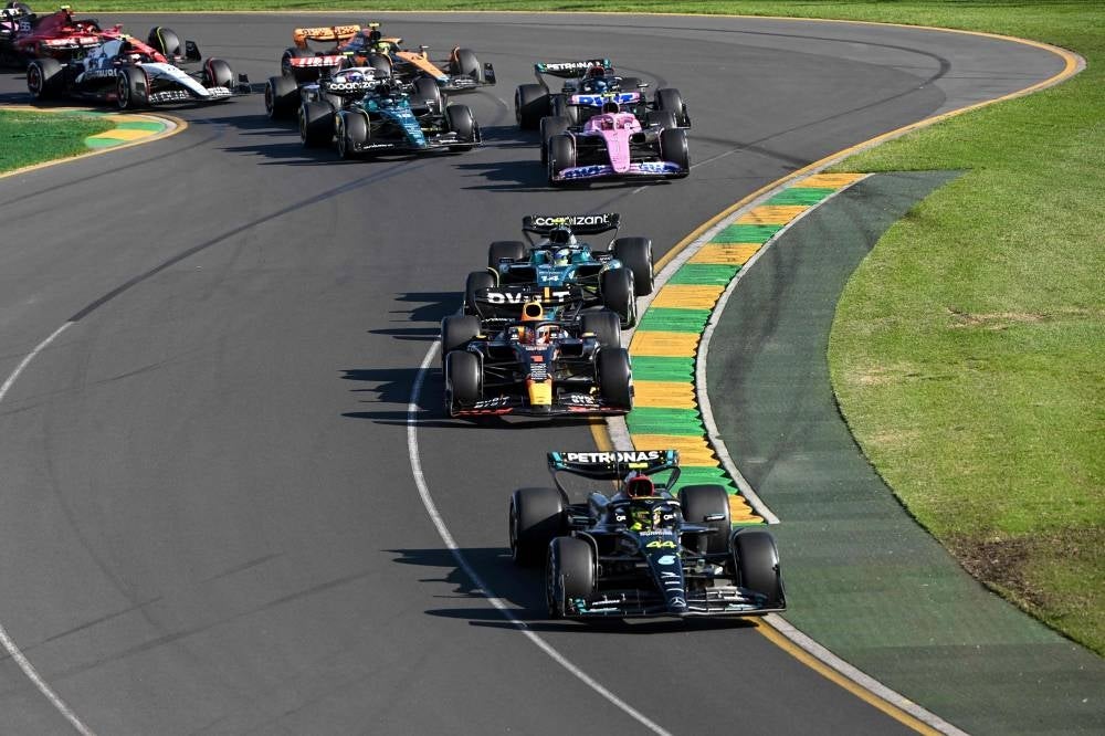 Mercedes' British driver Lewis Hamilton leads the field during a restart during the 2023 Formula One Australian Grand Prix at the Albert Park Circuit in Melbourne on April 2. - Pic: AFP