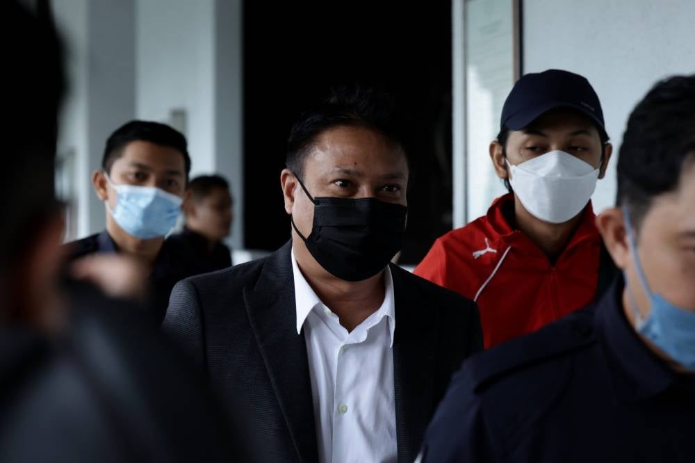 Abdul Hamid Shaikh, 49, claimed trial to offering RM500,000 a year for 15 years for the benefit of Tan Sri Annuar Musa regarding the takeover of KL Tower concession, last year. - BERNAMA