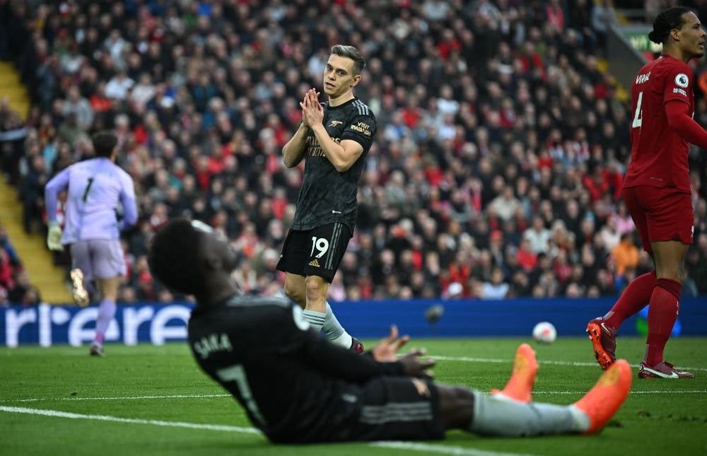 Arsenal's Belgian midfielder Leandro Trossard (C) reacts after failing to connect with a cross from Arsenal's English midfielder Bukayo Saka during the English Premier League football match between Liverpool and Arsenal at Anfield in Liverpool, north west England on April 9. - Pic: AFP
