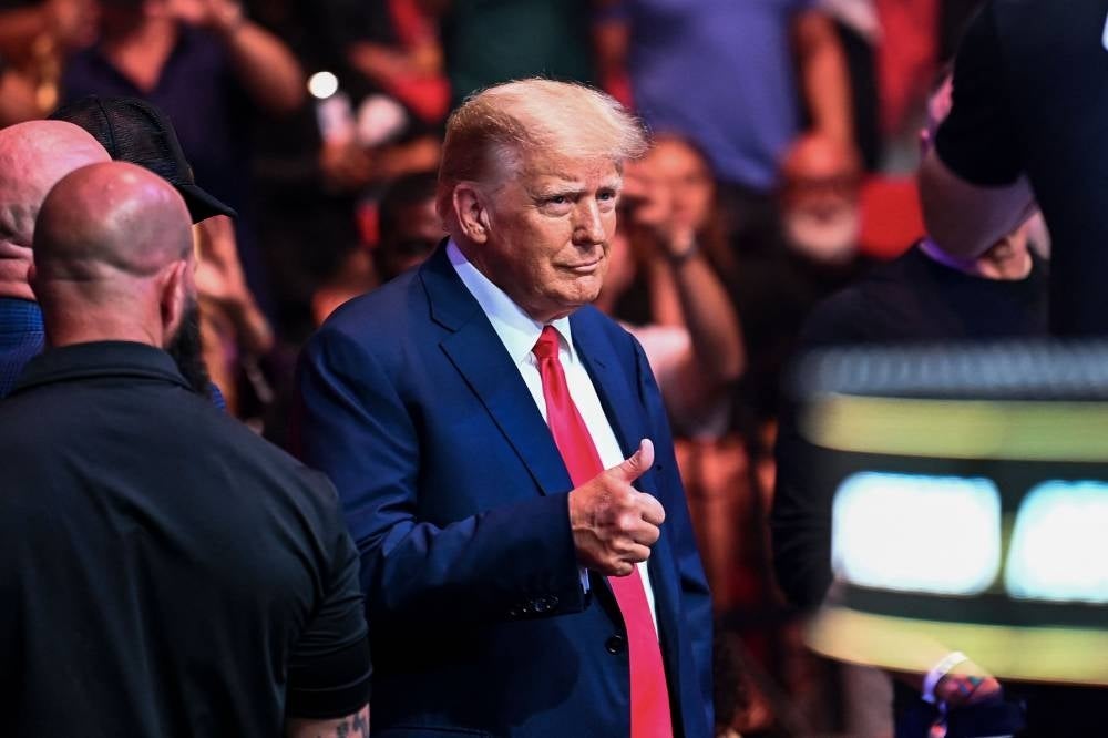 Former US President Donald Trump at the Ultimate Fighting Championship (UFC) 287 mixed martial arts event at the Kaseya Centre in Miami, Florida, on April 8, 2023. -(Photo by CHANDAN KHANNA / AFP)
