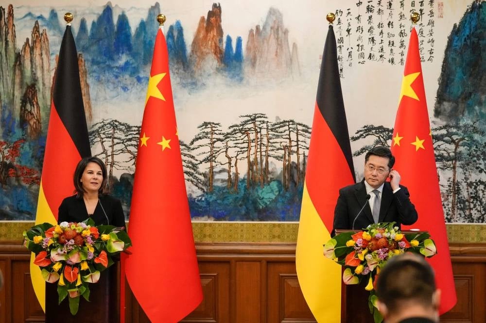 Chinese Foreign Minister Qin Gang (R) and Germany's Foreign Minister Annalena Baerbock attend a joint press conference at the Diaoyutai State Guesthouse in Beijing on April 14, 2023. (Photo by Suo TAKEKUMA / POOL / AFP)