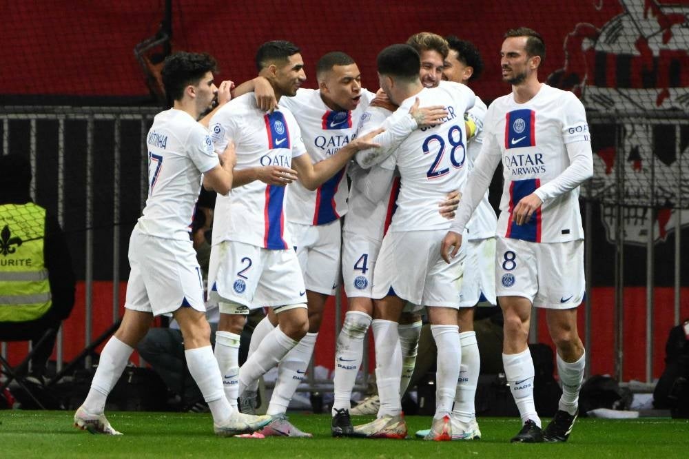 Paris Saint-Germain's Spanish defender Sergio Ramos (3rdR) celebrates with teammates after scoring a goal during the French L1 football match between Nice (OGCN) and Paris Saint-Germain (PSG) at the Allianz Riviera stadium in Nice, on April 8. - Pic: AFP