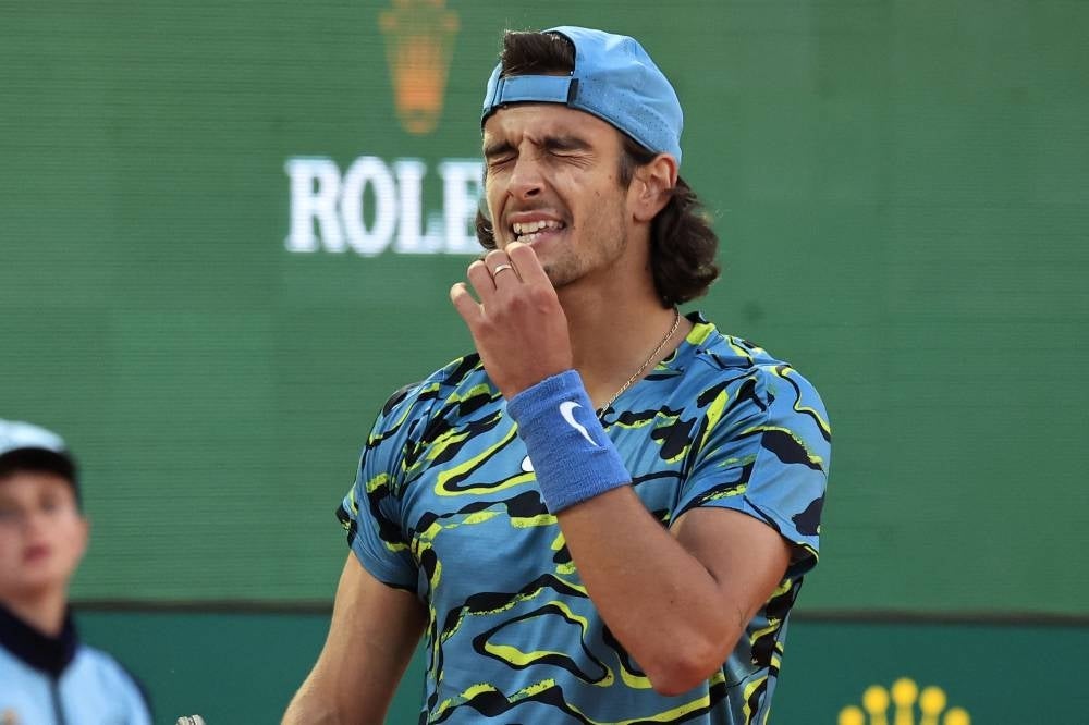 Italy's Lorenzo Musetti reacts during his match against Serbia's Novak Djokovic at the Monte-Carlo ATP Masters Series tournament round of 16 in Monte Carlo on April 13. - Pic: AFP