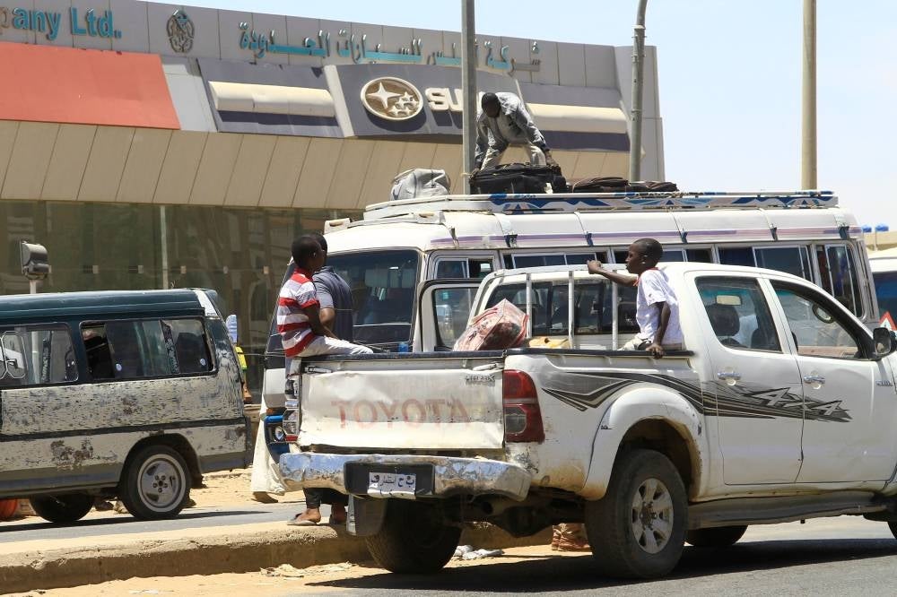 People flee from southern Khartoum on April 18, as fighting between the army and paramilitary forces led by rival generals rages for a fourth day, despite growing international calls for an end to hostilities. - Pic: AFP