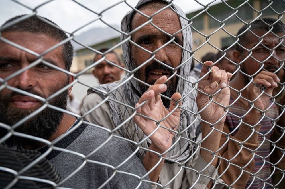 Men wait to be released from a drug rehabilitation and treatment centre after the completion of their treatment, on the outskirts of Kabul on April 18. - Pic: AFP