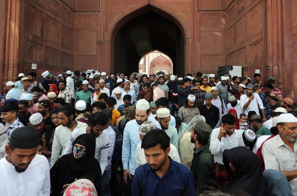Indian people leave after offering prayers at Jama masjid in old quarters of Delhi, India, April 14. The world’s population has reached 8 billion on Nov 15, 2022, with China and India, both with over one billion people, being the two most populous countries. The United Nations Population Fund has projected India will surpass China as the world's most populous country in 2023, with about 1,429 people, while China’s population has been decreasing and UN projections estimate it will be around 1,426 billion people by the end of 2023. - Pic: EPA