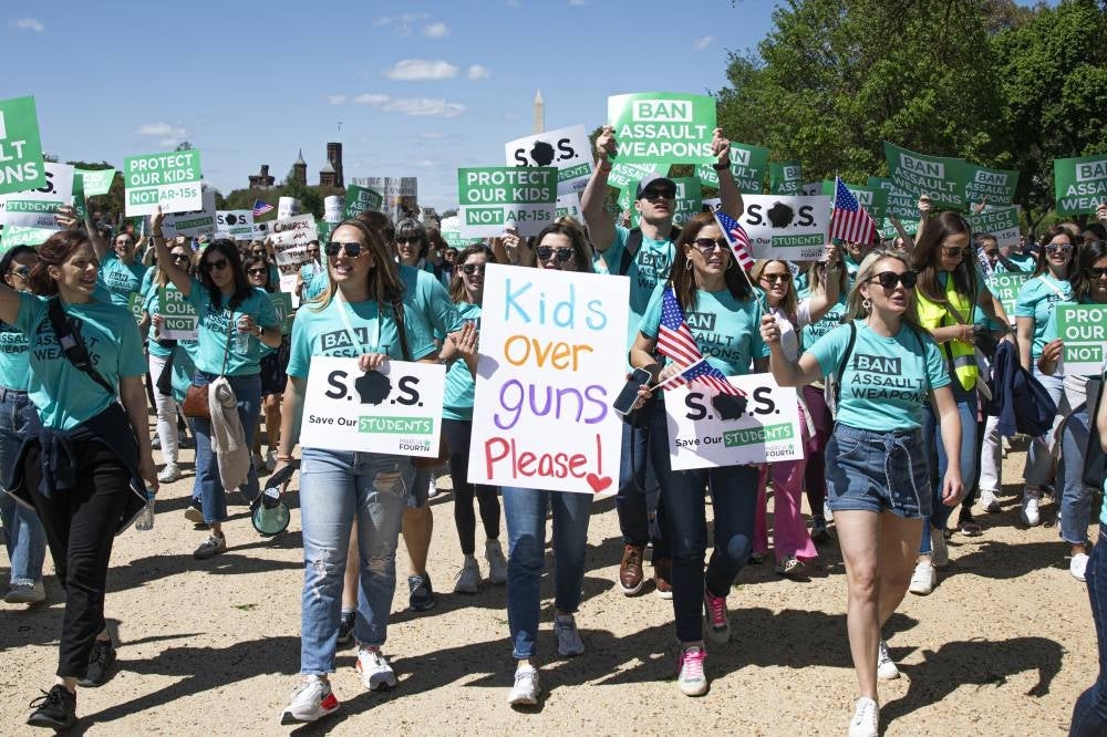 People march to the Capitol to protest for a ban on assault weapons, in Washington, D.C., the United States, on April 17. Four people were killed and at least 28 others injured in a shooting at a birthday party on Saturday night in the small Alabama town of Dadeville, the United States, authorities said Sunday. This incident took the United States to a bleak milestone of more than 160 mass shootings so far this year, with 12,277 deaths from gun violence, according to a database run by the nonprofit research group Gun Violence Archive. - Pic: XINHUA
AFP reported that two African American cheerleaders were shot in a Texas parking lot after one mistakenly tried to enter the wrong car, part of a spate of similar incidents this week in the United States.
The gunman fired multiple shots at the young women, seriously wounding one, police reported.