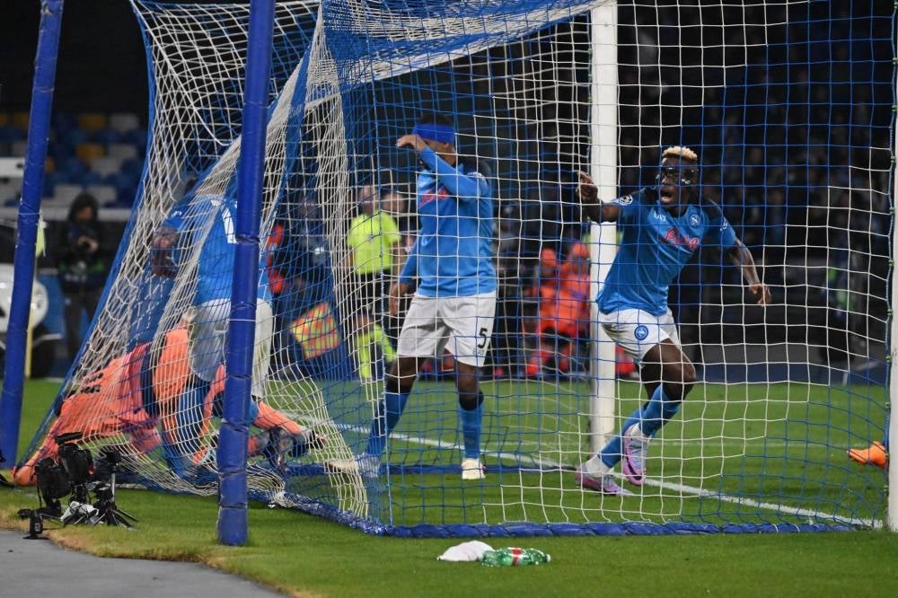 Napoli's forward Victor Osimhen scores the 1-1 during the UEFA Champions League quarter final second leg soccer match SSC Napoli vs AC Milan in Naples, Italy on April 18. - Pic: EPA
