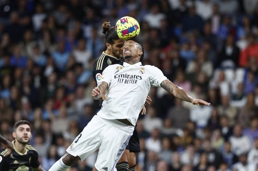 Real Madrid's Brazilian defender Eder Militao (R) duels for the ball with Celta's striker Goncalo Paciencia (L) during the Spanish LaLiga soccer match between Real Madrid and Celta de Vigo at Santiago Bernabeu Stadium in Madrid, Spain, April 22 . - Pic: EPA