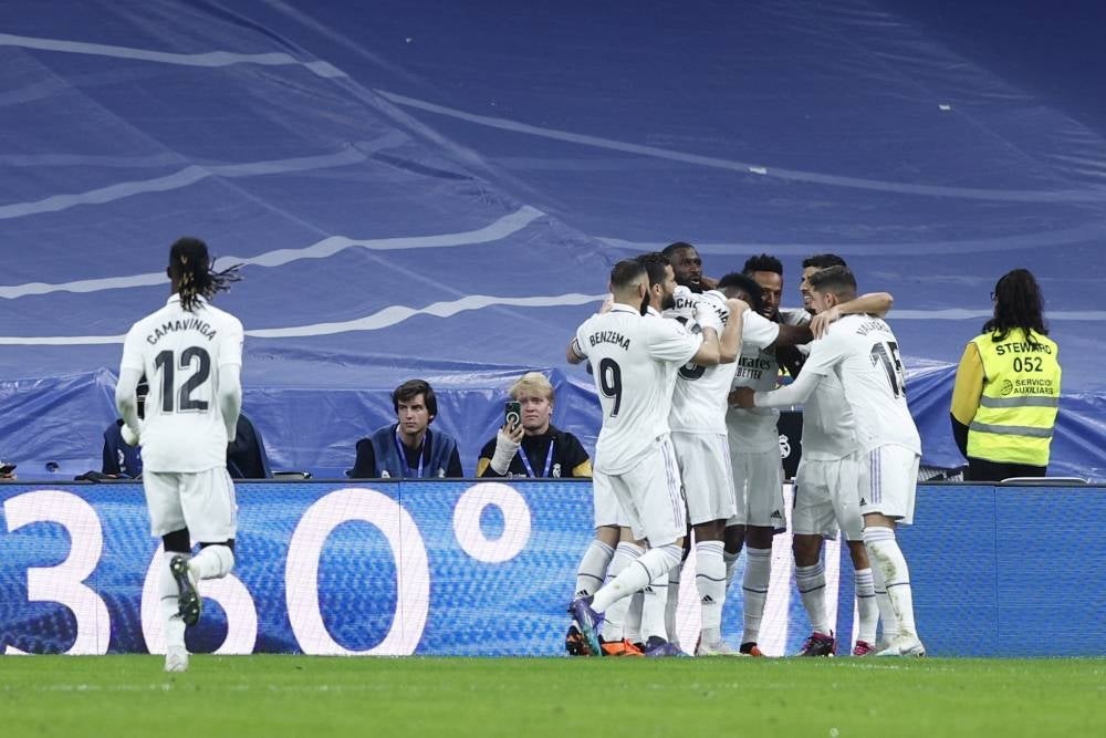 Real Madrid's Brazilian defender Eder Militao (3-L) celebrates with his teammates after scoring the 2-0 during the Spanish LaLiga soccer match between Real Madrid and Celta de Vigo at Santiago Bernabeu Stadium in Madrid, Spain, April 22. - Pic: EPA