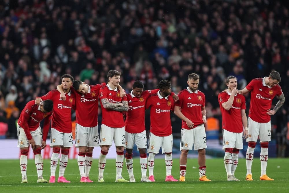 Manchester players react during the penalty shootout of the FA Cup semi-final match between Brighton and Hove Albion and Manchester United in London, April 23. - Pic: EPA
