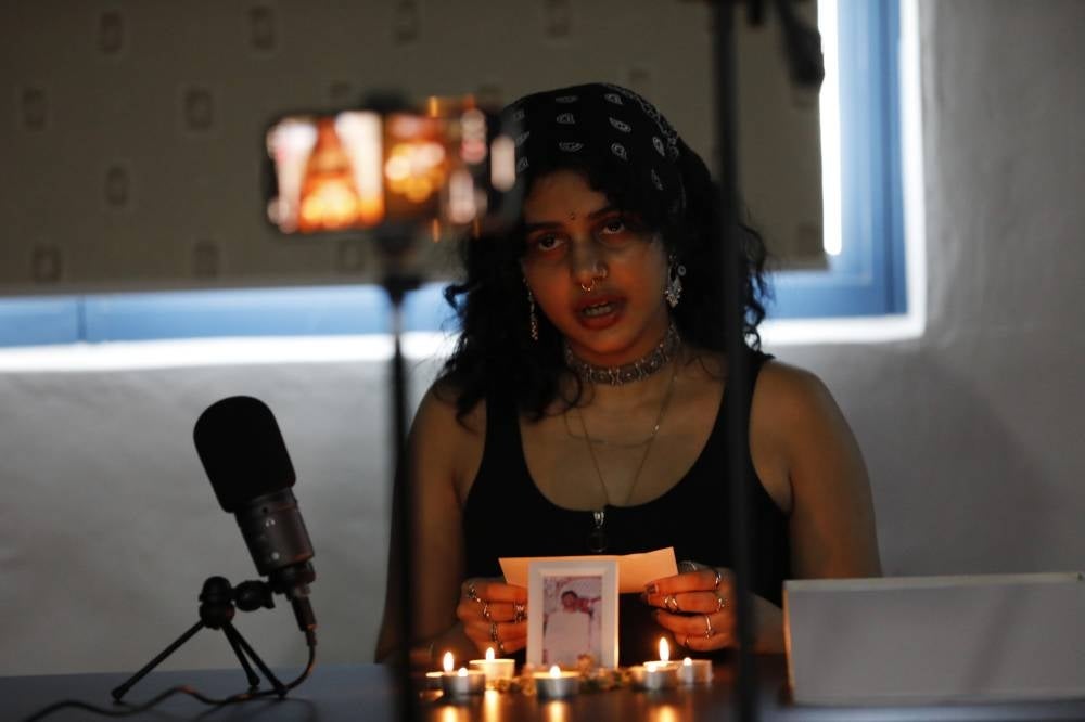  Sachi Wagh, an activist from a local anti-death penalty advocacy group, the Transformative Justice Collective (TJC), Sachi Wagh reads messages of support from the public during a livestream vigil for death row inmate Tangaraju Suppiah at a private office in Singapore on April 26. Suppiah was executed on April 26 according to the local anti-death penalty advocacy group the Transformative Justice Collective (TJC), in the country’s first capital punishment carried out in the year. Tangaraju was convicted for abetting an attempt to traffic one kilogram of cannabis in 2013. The case has reignited debate in the city state on capital punishment amid concerns by activists on the fairness of his trial and conviction. Pic: EPA