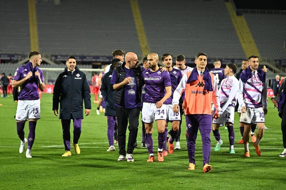 Fiorentina's players celebrate the victory at the end of the Coppa Italia semi final second leg match ACF Fiorentina vs US Cremonese at Artemio Franchi Stadium in Florence, April 27. - Pic: AFP