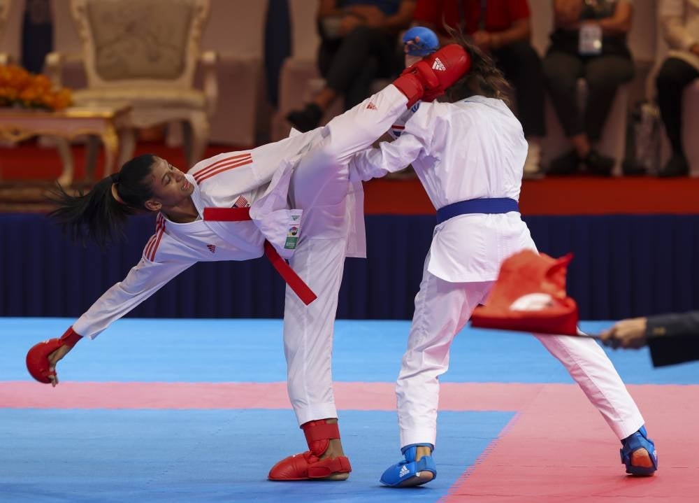 Karate athlete C. Shahmalarani contributed the nation's first gold in the women's kumite below 50kg event at the Chroy Changvar Convention Center, here. - BERNAMA