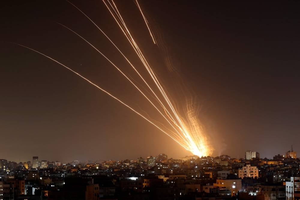  Rockets are fired from Gaza City toward Israel, on May 10, 2023. Israel's army and Gaza militants traded heavy cross-border fire on May 10, with 22 Palestinians killed over two days amid the worst escalation of violence to hit the coastal territory in months - AFP