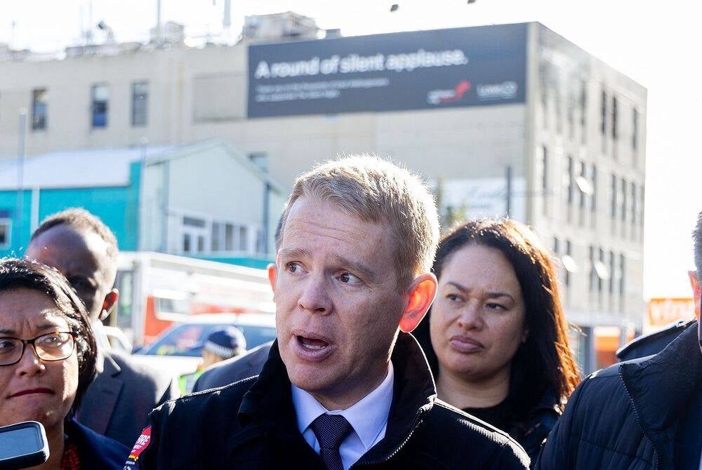 Prime Minister of New Zealand Chris Hipkins speaks to media about the fatal fire at the Loafers Lodge hostel building in the Wellington suburb of Newtown that has killed up to 6 people in Wellington on May 16, 2023. At least six people have been killed in a fire that erupted in the early hours of Tuesday, May 16, 2023 in a four-storey hostel in Wellington, capital city of New Zealand. (Photo by Marty MELVILLE / AFP)