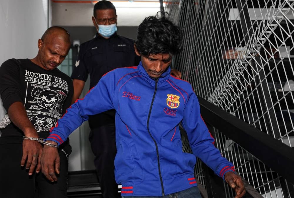 Gardener Abdul Rahman Abdullah, 37, (right) pleaded guilty at the Ipoh Sessions Court today to a charge of abusing his girlfriend’s daughter since last April. - BERNAMA