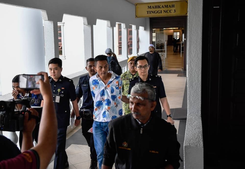 A butcher, Sharil Mohd Sarif, 40, who was jailed three times for insulting the Yang di-Pertuan Agong on social media, was charged again today with a similar offence in the Kuala Lumpur Sessions Court. - BERNAMA