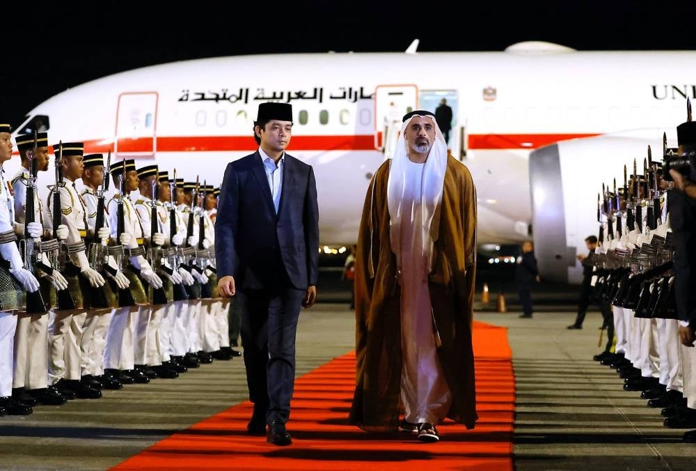 Crown Prince of Abu Dhabi and Chairman of the Executive Council of Abu Dhabi, Sheikh Khaled bin Mohamed bin Zayed Al Nahyan, was welcomed by the Regent of Pahang, Crown Prince Tengku Hassanal Ibrahim Alam Shah Al-Sultan Abdullah Ri'ayatuddin Al-Mustafa Billah Shah, upon his arrival at the Bunga Raya Complex, Kuala Lumpur International Airport (KLIA). - Bernama pic