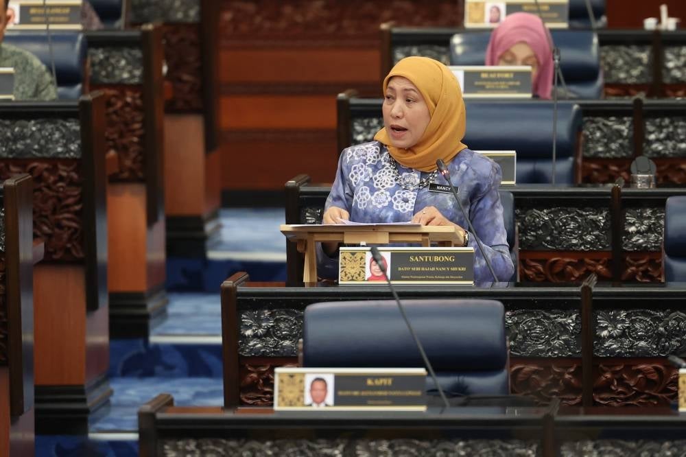 Women, Family and Community Development Minister Datuk Seri Nancy Shukri during the question and answer session at the 15th Parliament Second Term First Meeting at the Parliament Building on Monday. - Bernama pic