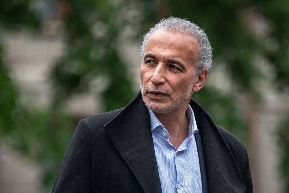 Swiss leading Islamic scholar Tariq Ramadan leaves Geneva's courthouse on May 24, 2023, after he was acquitted at the end of his trial for "rape and sexual coercion" in a case dating back 15 years. (Photo by FABRICE COFFRINI / AFP)