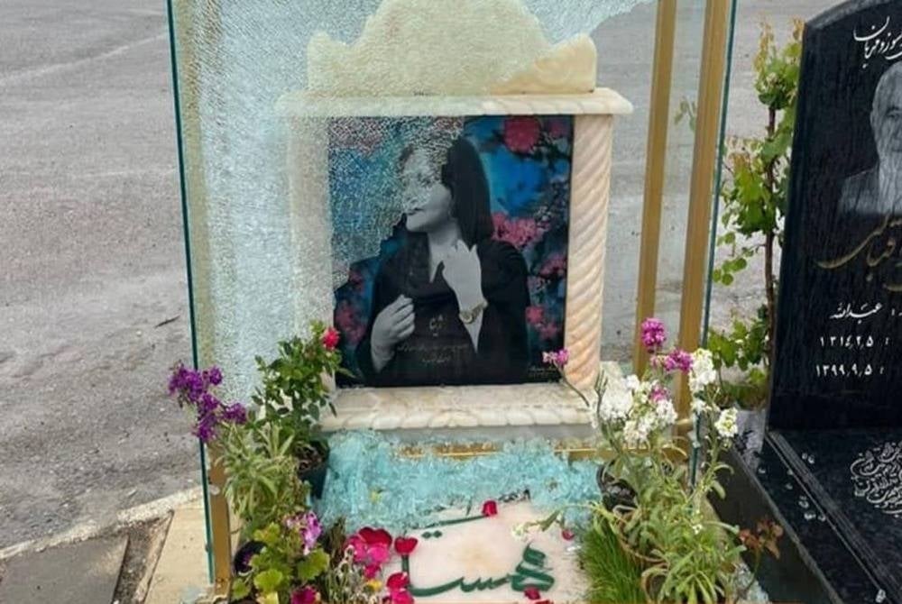 Images published on social media, said to be from the Instagram account of her brother Ashkan, showed that the glass protecting a portrait of Amini at the head of the tombstone had shattered. - Instagram