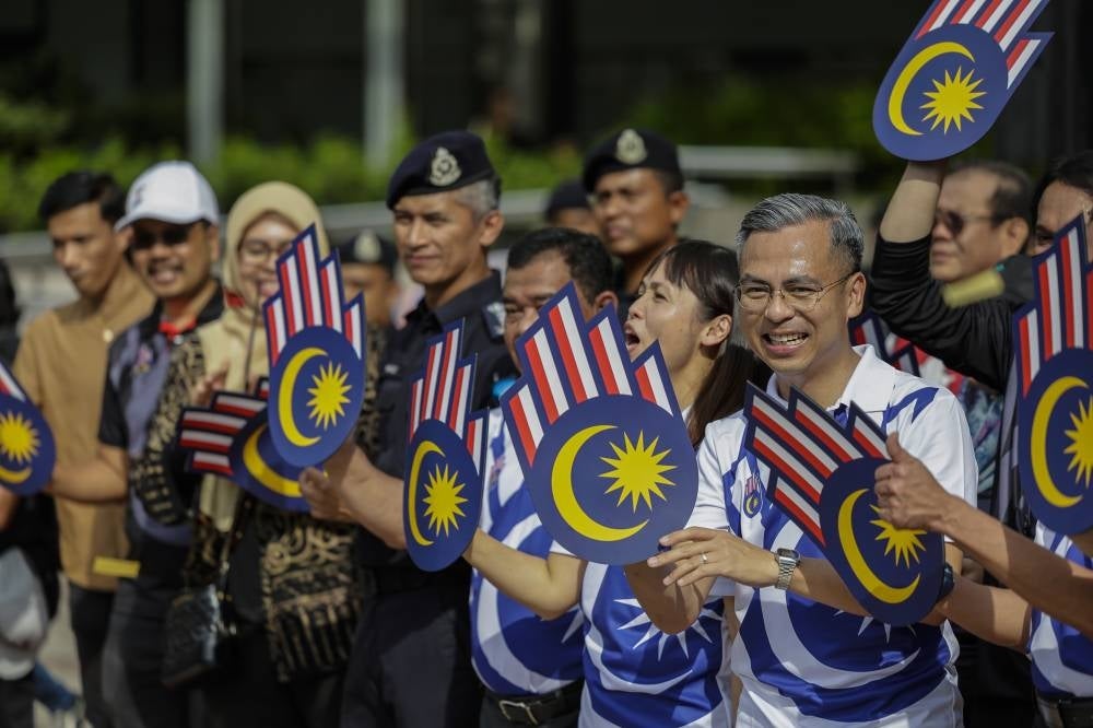 Communications and Digital Minister Fahmi Fadzil and his deputy Teo Nie Ching (second, right) during the launch of the HKHM 2023 logo and theme at the Esplanade, KLCC Park here today. Photo by Bernama.