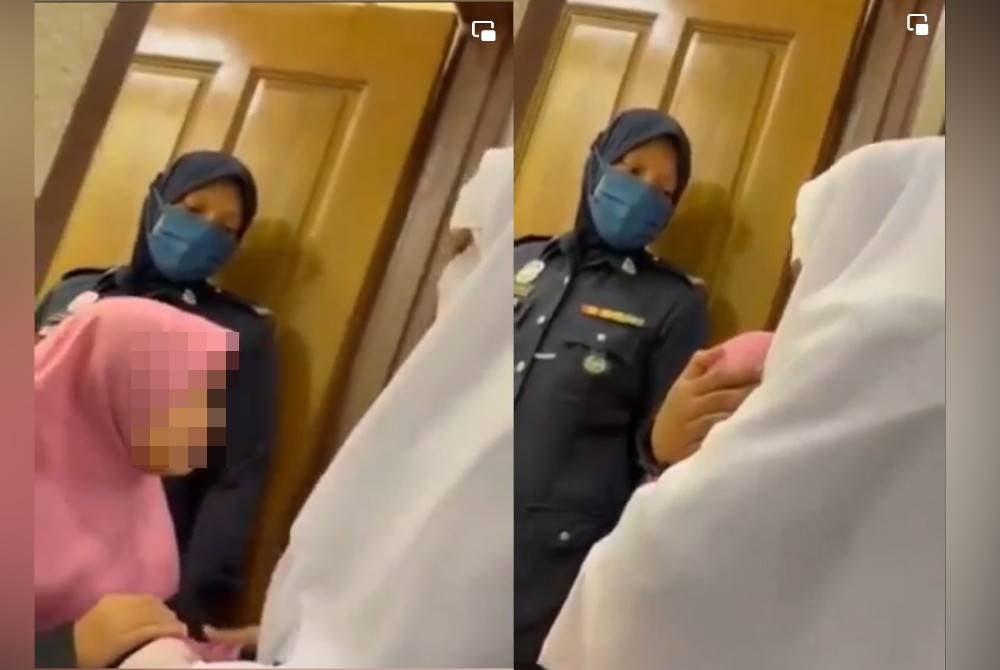 The child crying after her father won the child custody in Kuantan High Court. - Screenshots of the video circulating on social media.