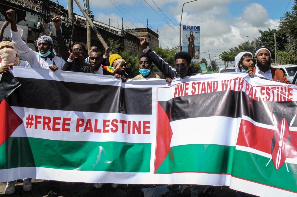 Kenyans protest against the bombings in Gaza by the West Bank earlier this year. (Photo by AFP)