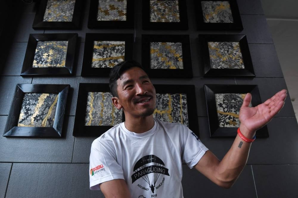 In this picture taken on June 2, 2023, Nepali guide Gelje Sherpa speaks during an interview with AFP in Kathmandu. (Photo by Prakash MATHEMA / AFP)