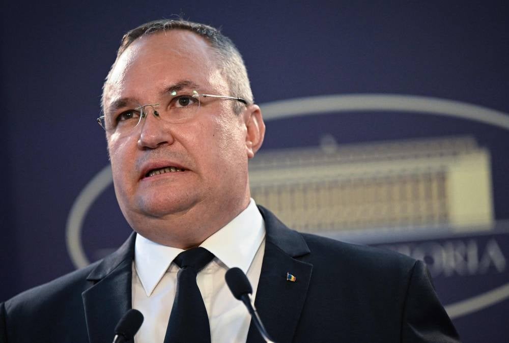 Romanian Prime Minister Nicolae Ciuca addresses the media as he announces his resignation from office in coalition deal, at the Victoria Palace, the Romanian government headquarters, in Bucharest on June 12, 2023. Photo by Daniel Mihailescu/AFP