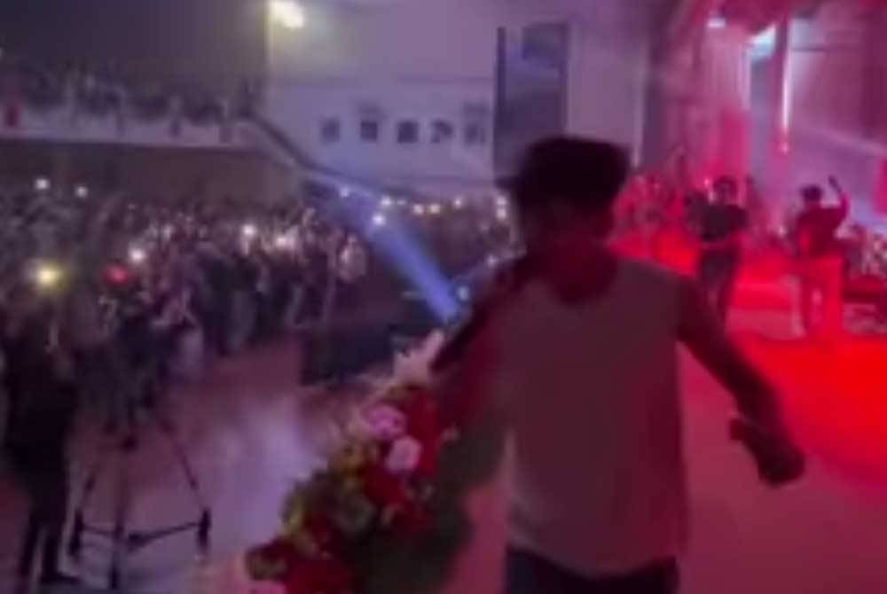 A screenshot of the viral concert video said to be held at a hall of a university in Terengganu.
