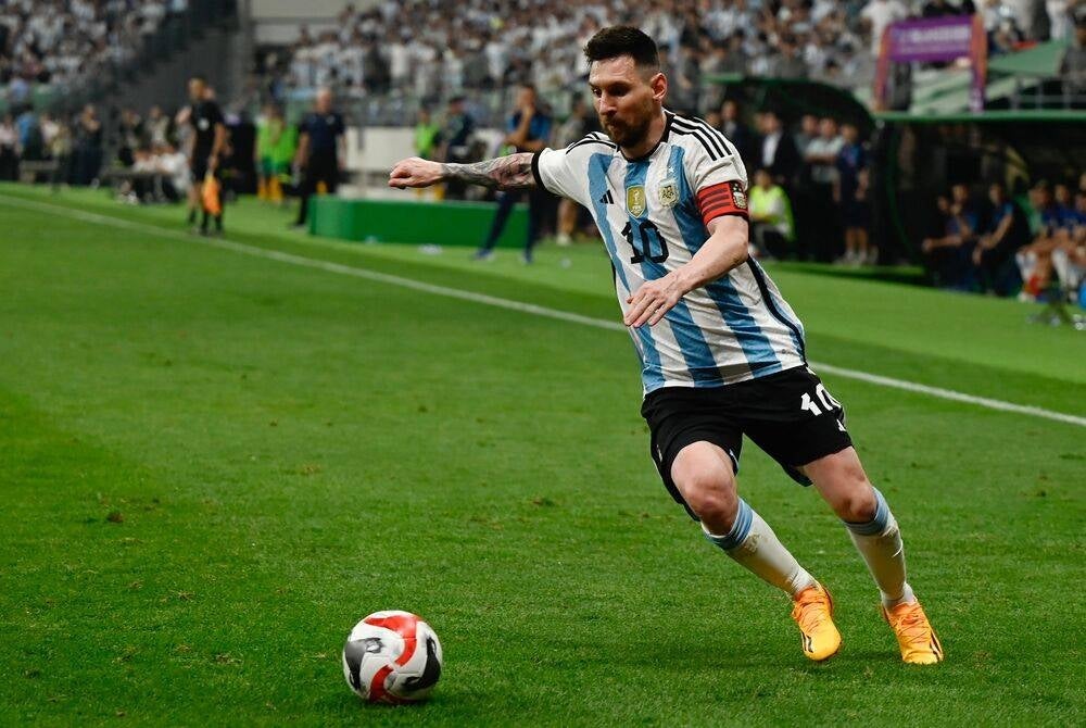 Argentina's Lionel Messi vies during a friendly football match against Australia at the Workers' Stadium in Beijing on June 15, 2023. (Photo by Pedro Pardo / AFP)