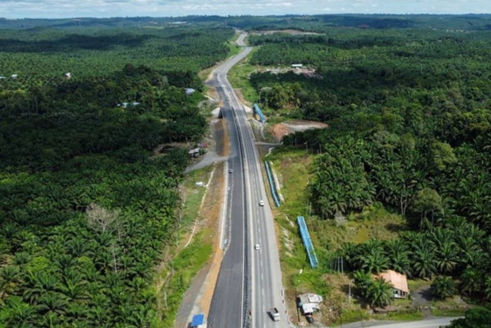 Sarawak deputy premier Datuk Amar Douglas Uggah Embas today advised motorists to abide by regulations when using the Pan Borneo Highway. - Photo by Bernama